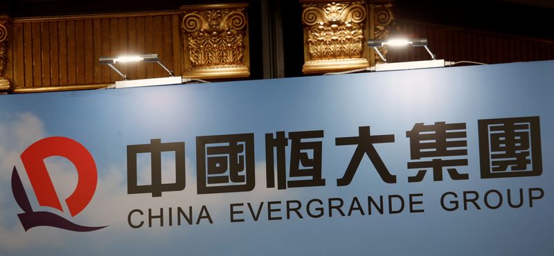 A logo of China Evergrande Group is displayed at a