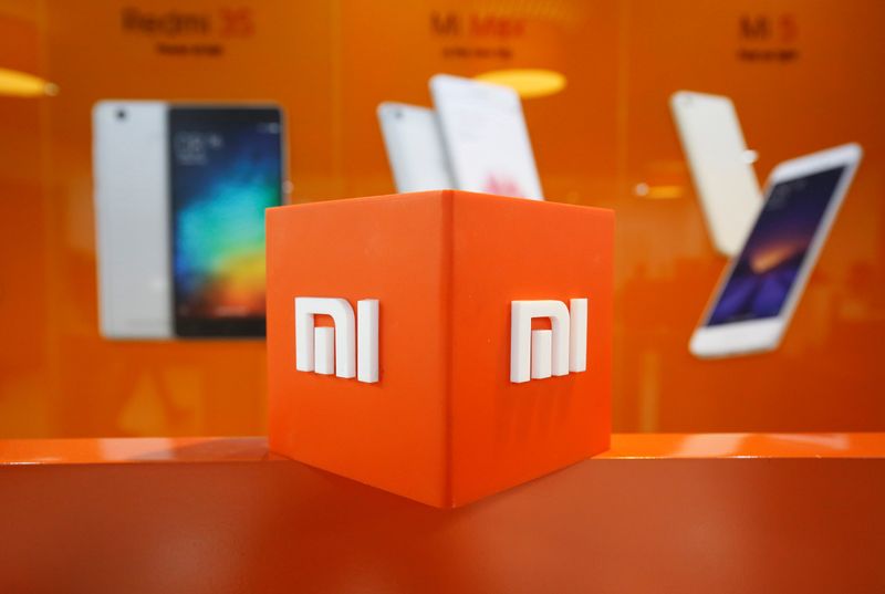 FILE PHOTO: The logo of Xiaomi is seen inside the