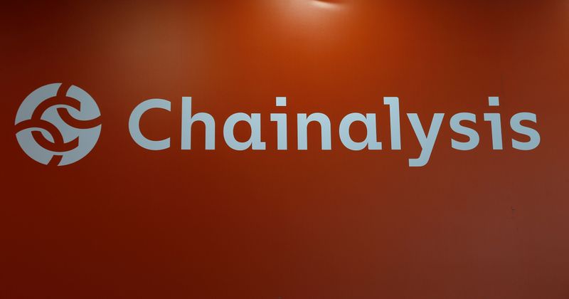 The logo of Chainalysis is seen on their exhibition stand