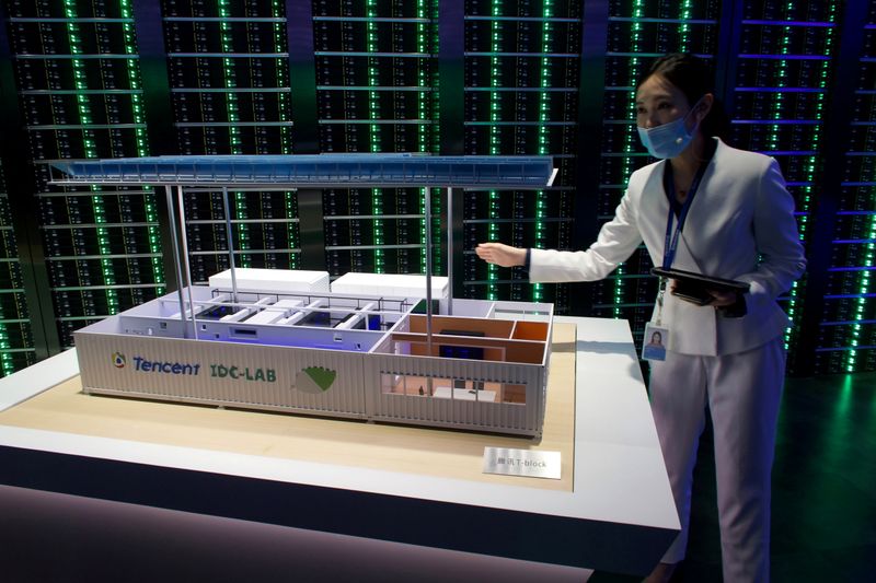 FILE PHOTO: Staff member introduces Tencent’s Internet Data Center (IDC)
