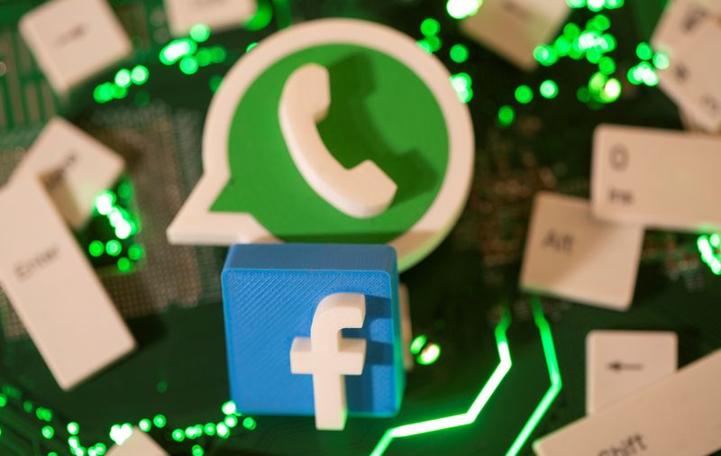 FILE PHOTO: Illustration of 3D printed Facebook and WhatsApp logos