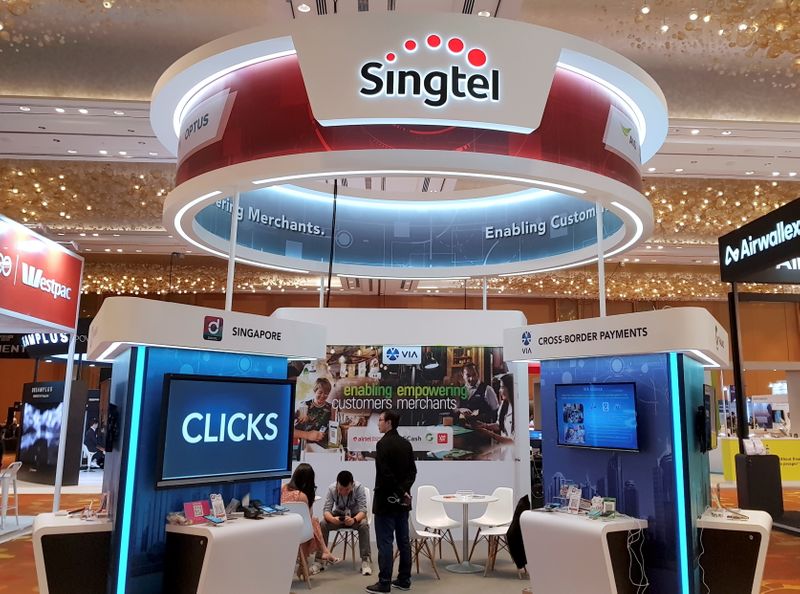 FILE PHOTO: A Singtel booth is pictured at the Money
