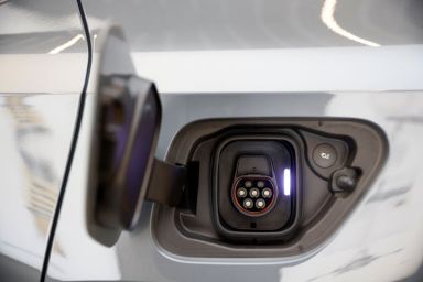 The Polestar 2 electric car’s charging port is seen at