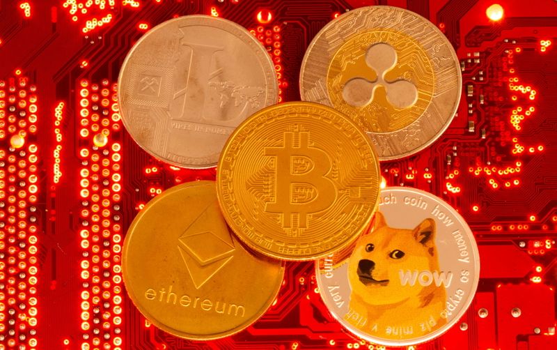 FILE PHOTO: Representations of cryptocurrencies Bitcoin, Ethereum, DogeCoin, Ripple, Litecoin