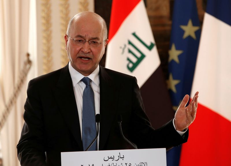 FILE PHOTO: Iraqi President Barham Salih speaks during a news
