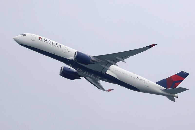 A Delta Air Lines plane takes off from Sydney Airport
