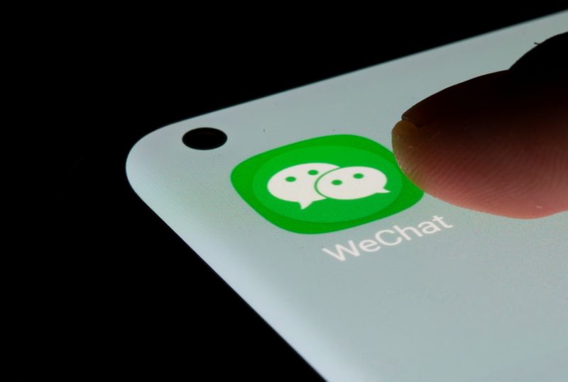 WeChat app is seen on a smartphone in this illustration