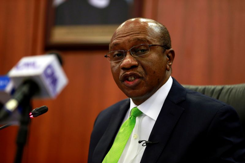 FILE PHOTO: Nigeria’s Central Bank Governor Godwin Emefiele briefis the