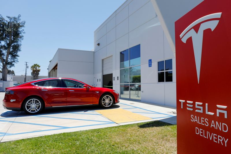 FILE PHOTO: A Tesla sales and service center is shown