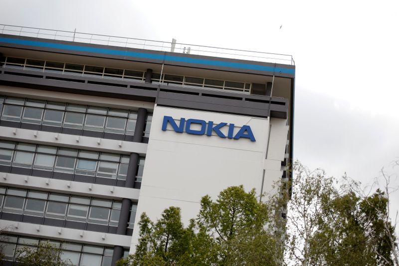 FILE PHOTO: Workers protest over job cuts at Nokia in