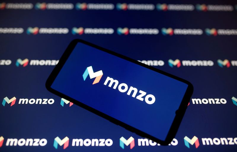 FILE PHOTO: A smartphone displays a Monzo logo in this