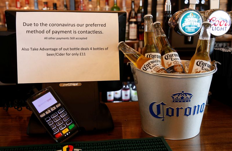 FILEPHOTO: A sign asking customers to only use contactless payment