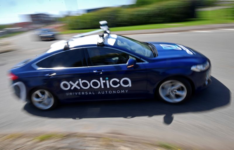 A passenger vehicle is seen traveling autonomously using Oxbotica software