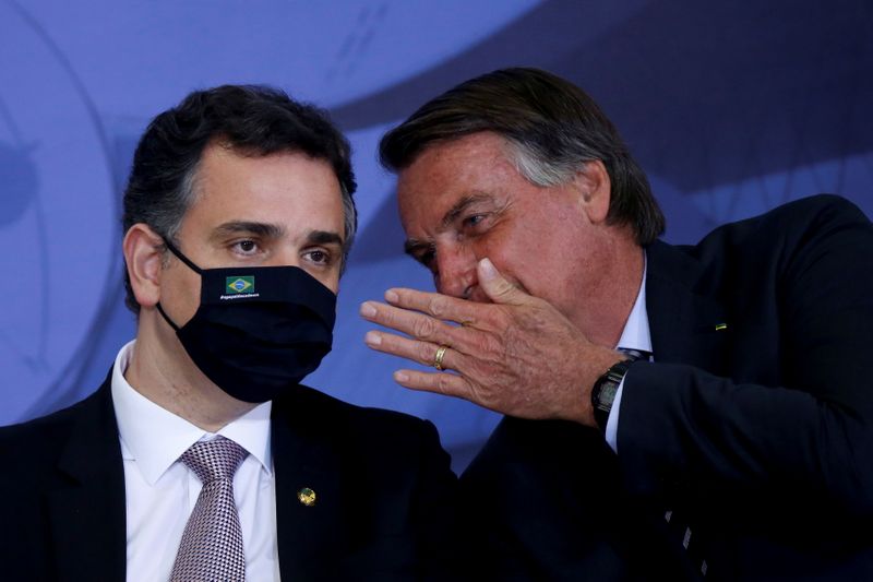 President of Brazil’s Senate Pacheco listens to Brazil’s President Bolsonaro