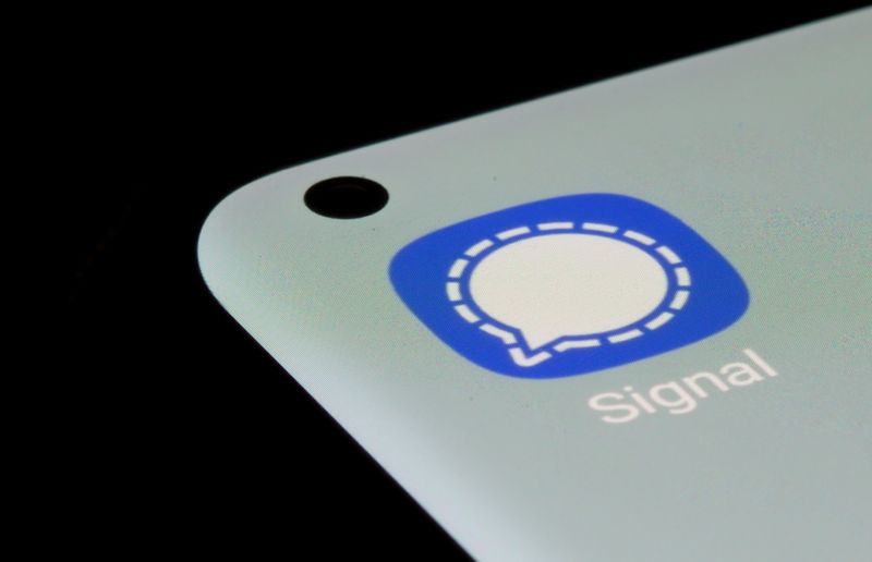 Signal app is seen on a smartphone in this illustration