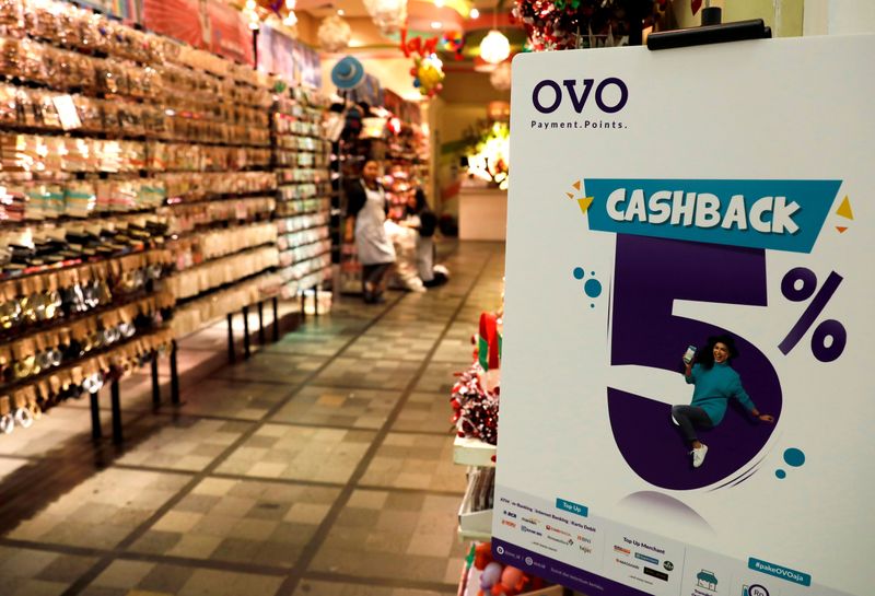 FILE PHOTO: A sign of OVO payment is seen at