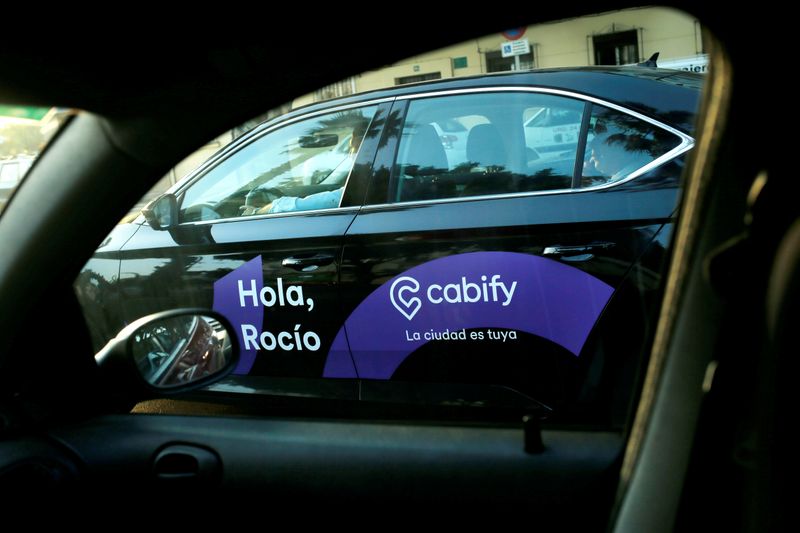 FILE PHOTO: A Cabify taxi car is seen through the