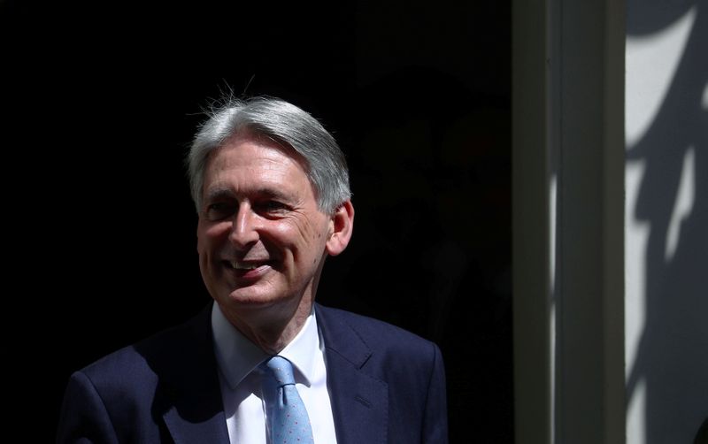 Chancellor of the Exchequer Philip Hammond leaves Downing Street in
