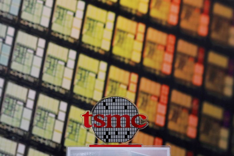 FILE PHOTO: A logo of Taiwan Semiconductor Manufacturing Co (TSMC)