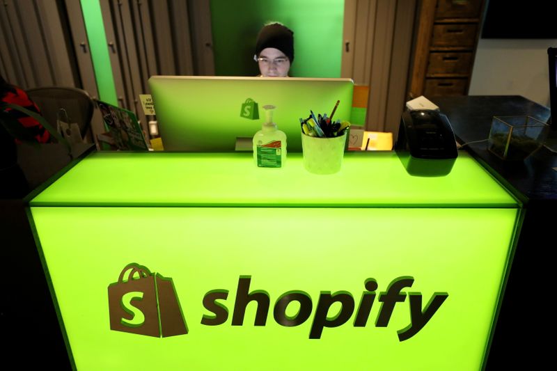 FILE PHOTO: FILE PHOTO: An employee works at Shopify’s headquarters