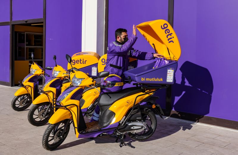Employee of Turkish fast grocery-delivery company Getir prepares to deliver