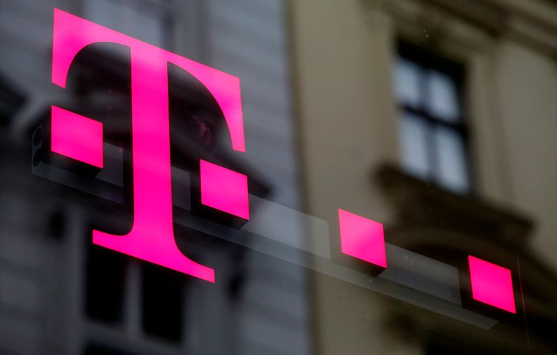 The logo of T-Mobile Austria is seen outside of one