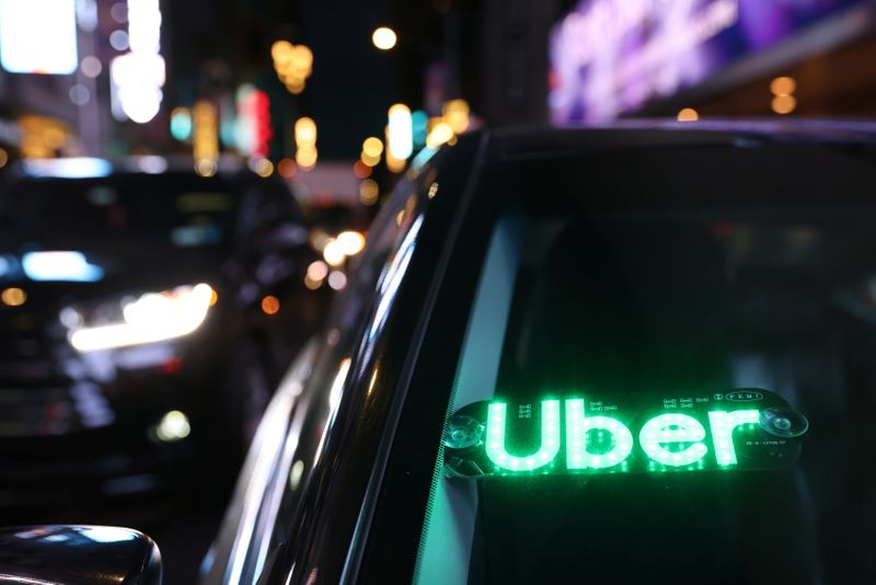 FILE PHOTO: The logo for Uber Technologies is seen on
