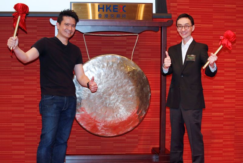 CEO of Razer Tan and non-executive director Lim pose during