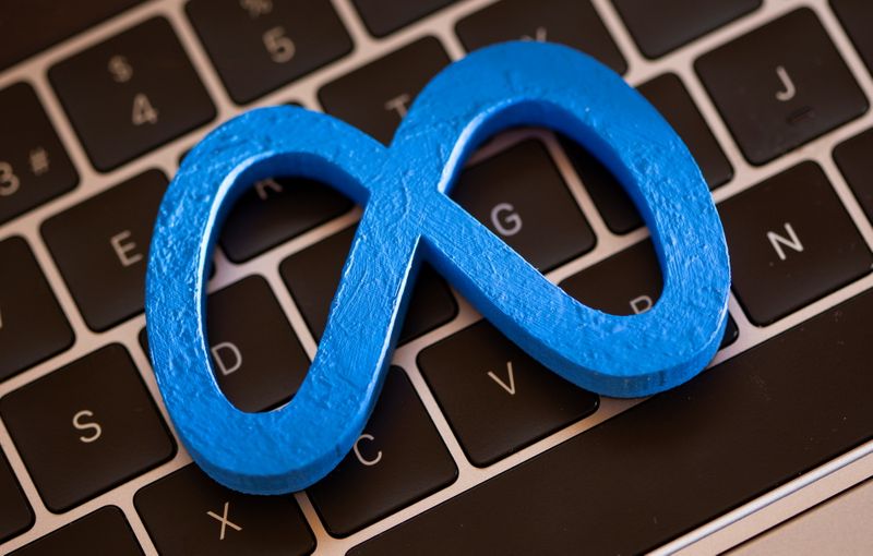 A 3D printed Facebook’s new rebrand logo Meta is placed