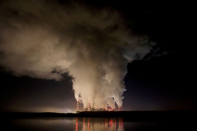 FILE PHOTO: Smoke and steam billows from Belchatow Power Station