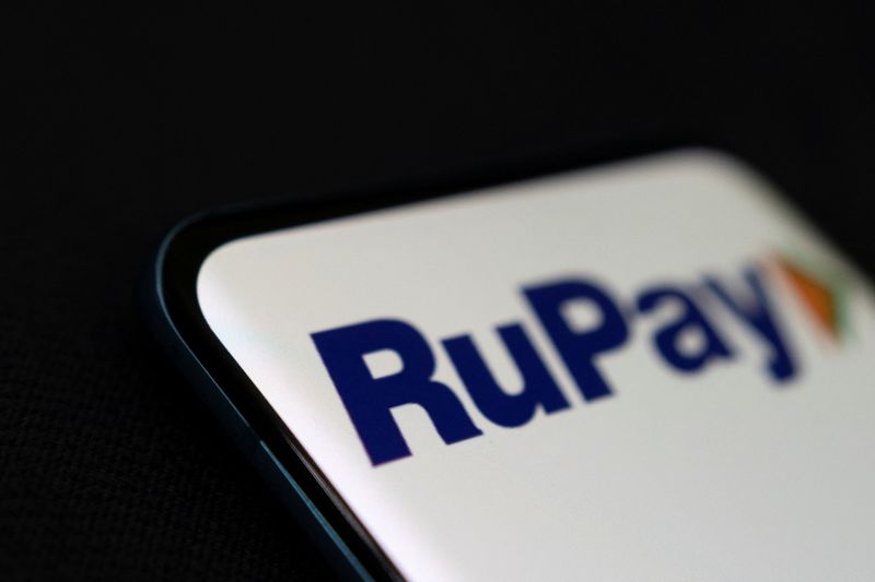 RuPay logo is displayed on the smartphone in this illustration