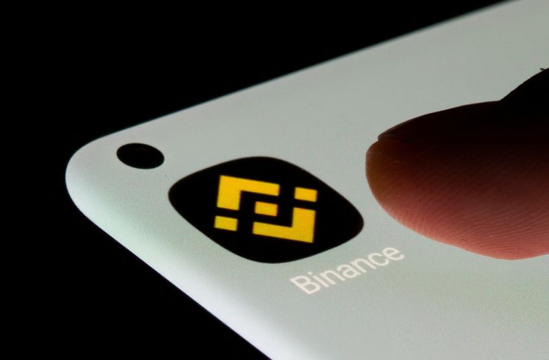 Binance app is seen on a smartphone in this illustration