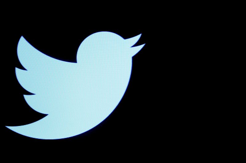 FILE PHOTO: The Twitter logo displayed on a screen on