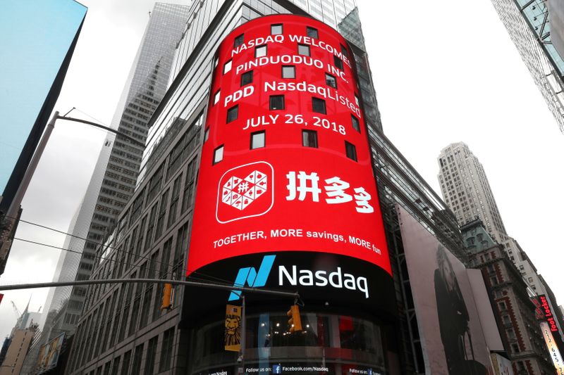 FILE PHOTO: A display at the Nasdaq Market Site shows