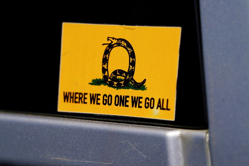 FILE PHOTO: A sticker that references the QAnon slogan is