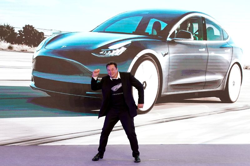 FILE PHOTO: Tesla Inc CEO Elon Musk dances onstage during