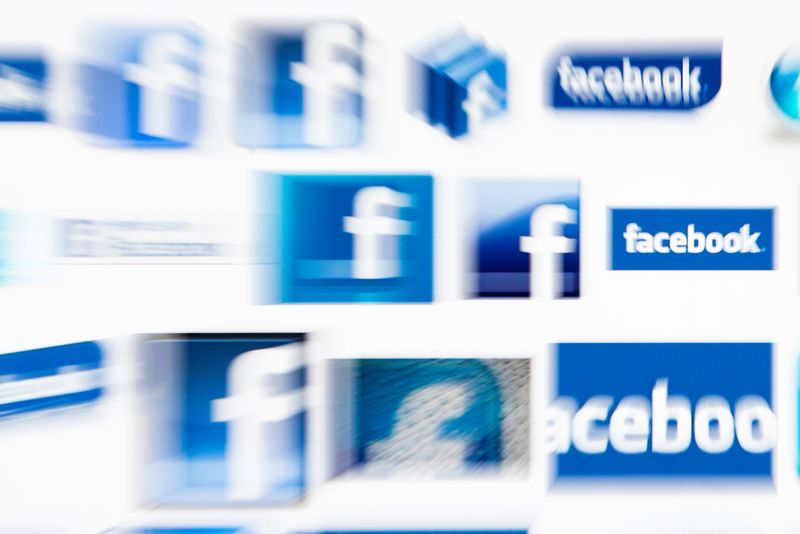 FILE PHOTO: Facebook logos on a computer screen are seen