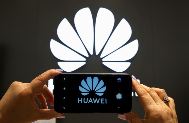 FILE PHOTO: A Huawei logo is seen on a cell