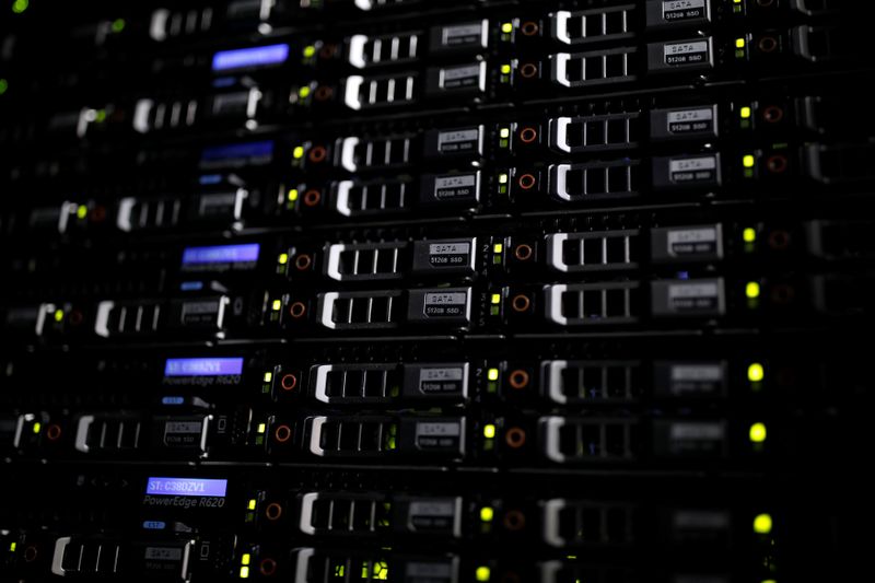 FILE PHOTO: Lights illuminate rack servers inside the data center
