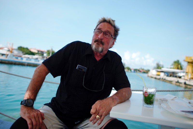 FILE PHOTO: John McAfee speaks during an interview in Havana