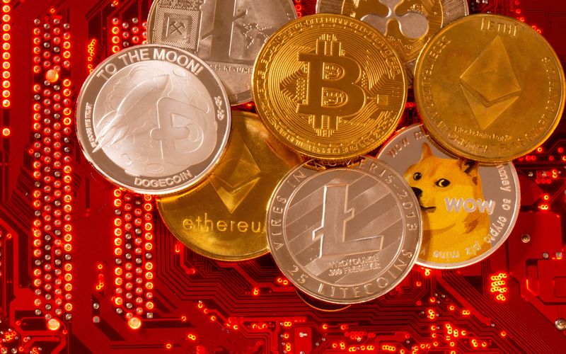 FILE PHOTO: FILE PHOTO: Representations of cryptocurrencies Bitcoin, Ethereum, DogeCoin,