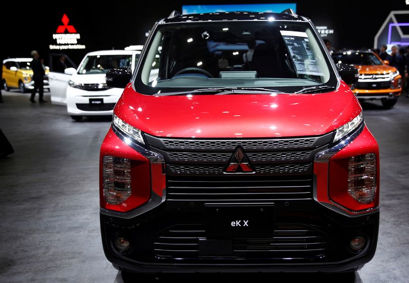 A Mitsubishi ek electric kei car is pictured at the