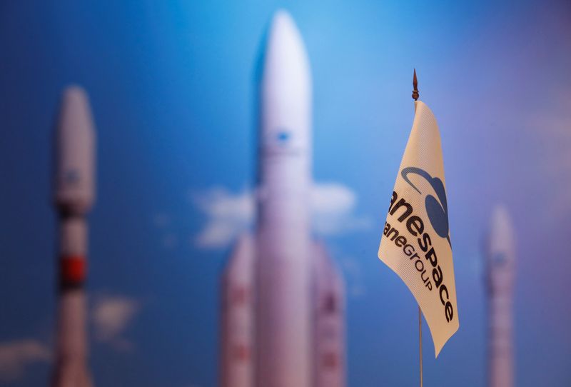 A flag with a company logo is seen during satellite