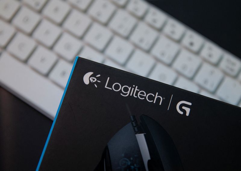 Logitech mouse is placed on the keyboard in the computer