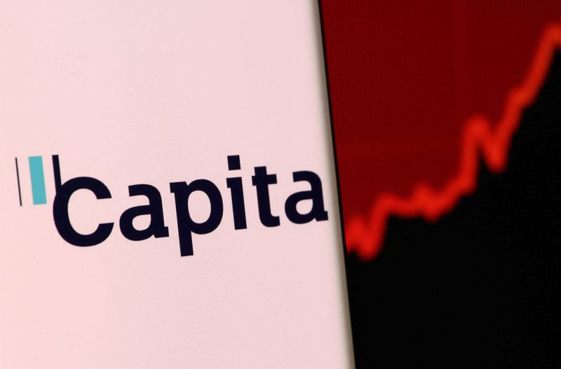 Illustration shows smartphone with Capita’s logo