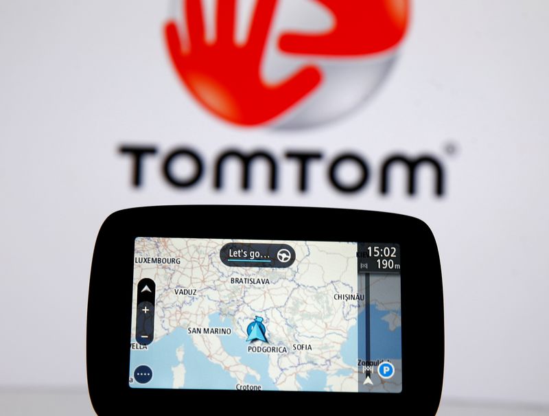 TomTom navigation are seen in front of TomTom displayed logo