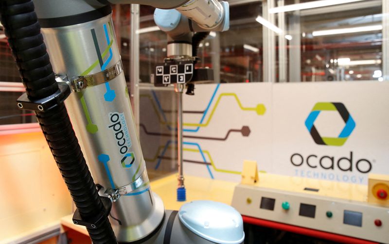 FILE PHOTO: Ocado robots are seen inside a warehouse in