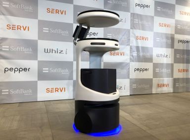 FILE PHOTO: SoftBank’s robotics arm displays a food service robot