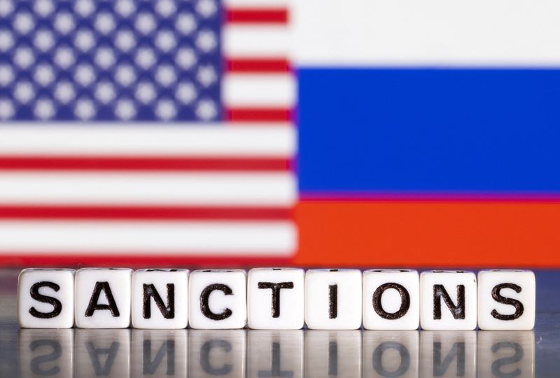 FILE PHOTO: Illustration shows letters arranged to read “Sanctions” in