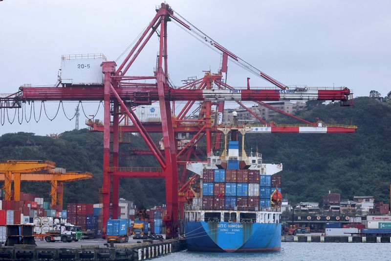 FILE PHOTO: A cargo ship is pictured at a port,